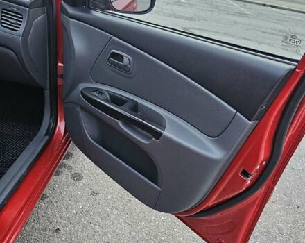 Красный Киа Рио, объемом двигателя 1.4 л и пробегом 180 тыс. км за 4500 $, фото 18 на Automoto.ua