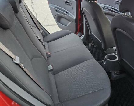 Красный Киа Рио, объемом двигателя 1.4 л и пробегом 180 тыс. км за 4500 $, фото 14 на Automoto.ua