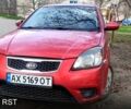 Червоний Кіа Ріо, об'ємом двигуна 1.4 л та пробігом 200 тис. км за 4800 $, фото 1 на Automoto.ua