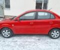 Красный Киа Рио, объемом двигателя 1.4 л и пробегом 180 тыс. км за 4750 $, фото 2 на Automoto.ua
