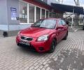 Червоний Кіа Ріо, об'ємом двигуна 1.4 л та пробігом 113 тис. км за 5899 $, фото 1 на Automoto.ua