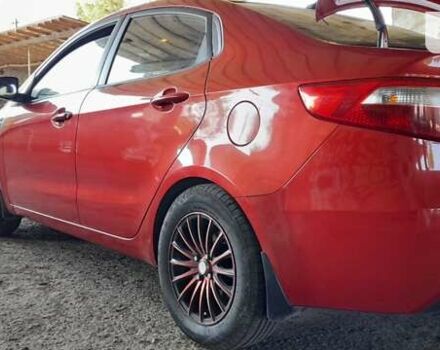 Красный Киа Рио, объемом двигателя 1.4 л и пробегом 319 тыс. км за 6000 $, фото 20 на Automoto.ua