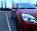 Красный Киа Рио, объемом двигателя 1.4 л и пробегом 168 тыс. км за 5000 $, фото 1 на Automoto.ua