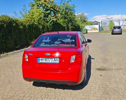 Красный Киа Рио, объемом двигателя 1.4 л и пробегом 142 тыс. км за 5699 $, фото 9 на Automoto.ua