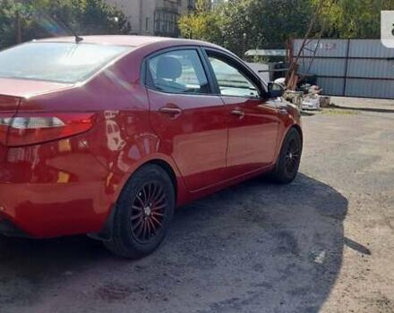 Красный Киа Рио, объемом двигателя 1.4 л и пробегом 319 тыс. км за 5700 $, фото 17 на Automoto.ua