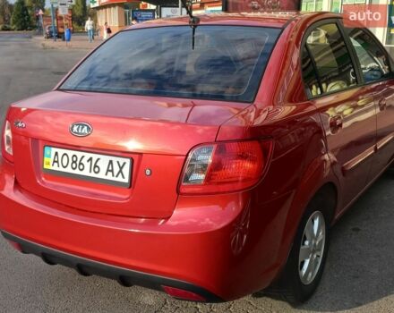Красный Киа Рио, объемом двигателя 1.4 л и пробегом 198 тыс. км за 7500 $, фото 1 на Automoto.ua