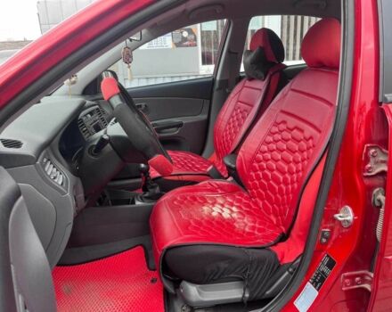 Червоний Кіа Ріо, об'ємом двигуна 1.4 л та пробігом 113 тис. км за 5899 $, фото 8 на Automoto.ua