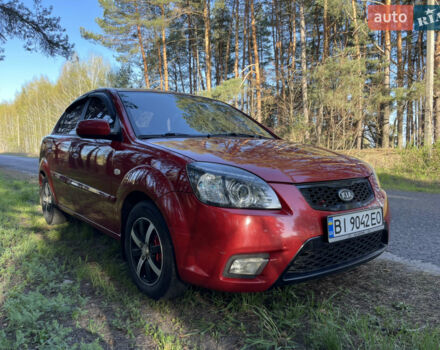 Червоний Кіа Ріо, об'ємом двигуна 1.4 л та пробігом 155 тис. км за 6500 $, фото 3 на Automoto.ua