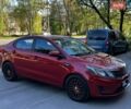 Червоний Кіа Ріо, об'ємом двигуна 1.4 л та пробігом 190 тис. км за 5999 $, фото 4 на Automoto.ua
