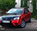Красный Киа Рио, объемом двигателя 1.4 л и пробегом 208 тыс. км за 3950 $, фото 1 на Automoto.ua