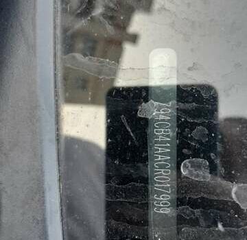 Красный Киа Рио, объемом двигателя 1.4 л и пробегом 319 тыс. км за 6000 $, фото 10 на Automoto.ua