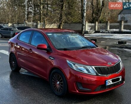 Червоний Кіа Ріо, об'ємом двигуна 1.4 л та пробігом 190 тис. км за 6350 $, фото 1 на Automoto.ua