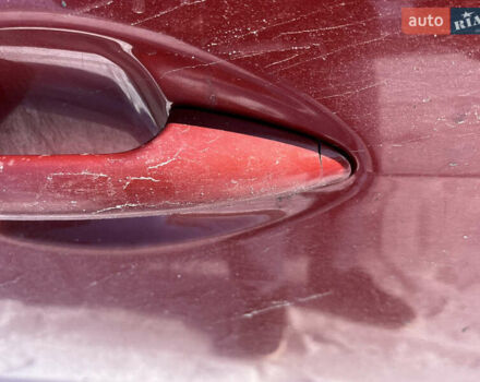 Червоний Кіа Ріо, об'ємом двигуна 1.4 л та пробігом 170 тис. км за 4500 $, фото 16 на Automoto.ua