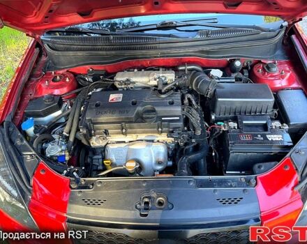 Красный Киа Рио, объемом двигателя 1.4 л и пробегом 155 тыс. км за 6700 $, фото 9 на Automoto.ua