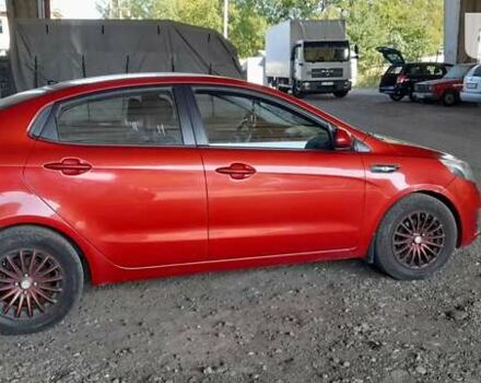 Красный Киа Рио, объемом двигателя 1.4 л и пробегом 319 тыс. км за 5700 $, фото 1 на Automoto.ua