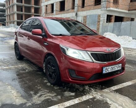 Червоний Кіа Ріо, об'ємом двигуна 1.4 л та пробігом 212 тис. км за 6000 $, фото 2 на Automoto.ua