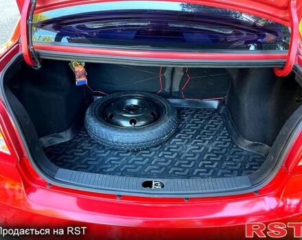 Красный Киа Рио, объемом двигателя 1.4 л и пробегом 155 тыс. км за 6700 $, фото 11 на Automoto.ua