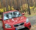 Красный Киа Рио, объемом двигателя 1.4 л и пробегом 213 тыс. км за 5000 $, фото 1 на Automoto.ua