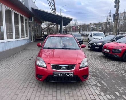 Червоний Кіа Ріо, об'ємом двигуна 1.4 л та пробігом 113 тис. км за 5899 $, фото 1 на Automoto.ua