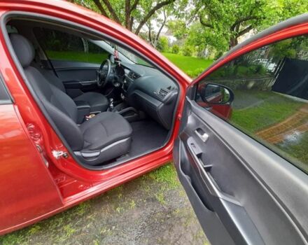Красный Киа Рио, объемом двигателя 1.4 л и пробегом 134 тыс. км за 6099 $, фото 9 на Automoto.ua