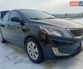 Красный Киа Рио, объемом двигателя 1.4 л и пробегом 225 тыс. км за 5950 $, фото 1 на Automoto.ua