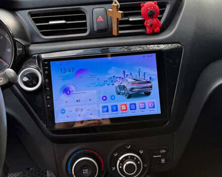 Червоний Кіа Ріо, об'ємом двигуна 1.4 л та пробігом 158 тис. км за 6500 $, фото 5 на Automoto.ua