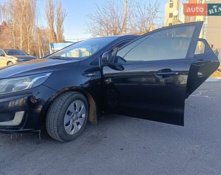 Красный Киа Рио, объемом двигателя 1.4 л и пробегом 225 тыс. км за 5950 $, фото 2 на Automoto.ua