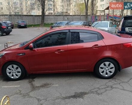 Червоний Кіа Ріо, об'ємом двигуна 1.4 л та пробігом 252 тис. км за 7000 $, фото 1 на Automoto.ua