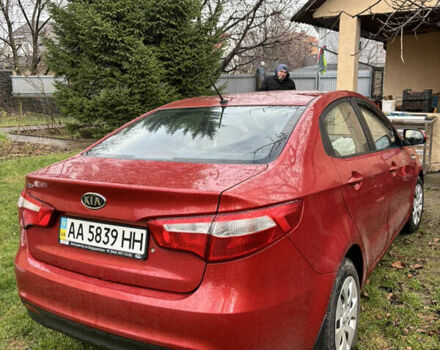 Червоний Кіа Ріо, об'ємом двигуна 1.4 л та пробігом 165 тис. км за 4500 $, фото 1 на Automoto.ua