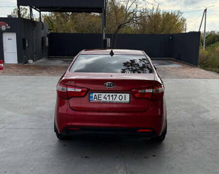 Червоний Кіа Ріо, об'ємом двигуна 1.4 л та пробігом 158 тис. км за 6500 $, фото 3 на Automoto.ua