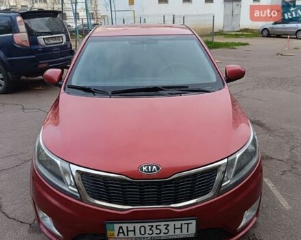 Червоний Кіа Ріо, об'ємом двигуна 1.4 л та пробігом 252 тис. км за 7000 $, фото 2 на Automoto.ua