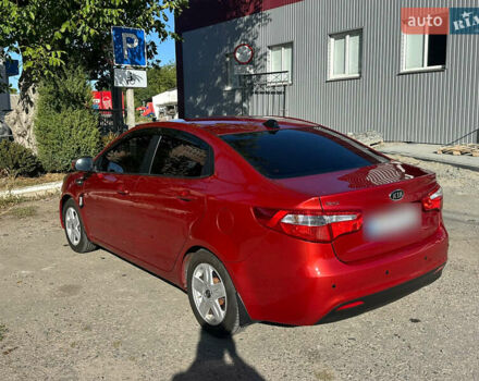 Киа Рио 2012 в Звенигородка на Automoto.ua Красный Киа Рио, объемом двигателя 1.6 л и пробегом 170 тыс. км за 8800 $, фото 2 на Automoto.ua