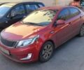 Червоний Кіа Ріо, об'ємом двигуна 1.4 л та пробігом 140 тис. км за 9000 $, фото 1 на Automoto.ua