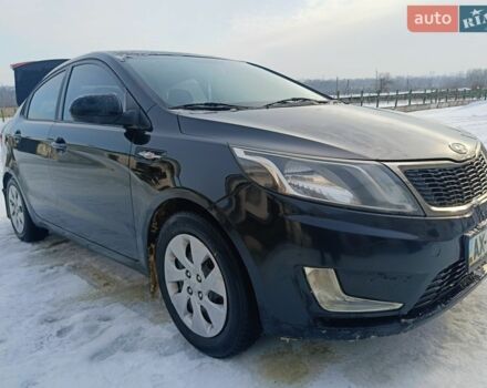 Красный Киа Рио, объемом двигателя 1.4 л и пробегом 232 тыс. км за 5300 $, фото 1 на Automoto.ua