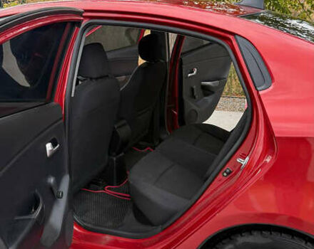 Червоний Кіа Ріо, об'ємом двигуна 1.4 л та пробігом 158 тис. км за 6500 $, фото 7 на Automoto.ua