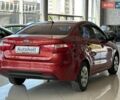 Червоний Кіа Ріо, об'ємом двигуна 1.4 л та пробігом 253 тис. км за 6690 $, фото 3 на Automoto.ua