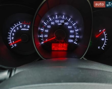 Червоний Кіа Ріо, об'ємом двигуна 1.4 л та пробігом 148 тис. км за 7950 $, фото 12 на Automoto.ua