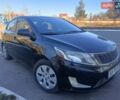 Красный Киа Рио, объемом двигателя 1.4 л и пробегом 225 тыс. км за 5950 $, фото 1 на Automoto.ua