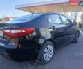 Красный Киа Рио, объемом двигателя 1.4 л и пробегом 225 тыс. км за 5950 $, фото 3 на Automoto.ua