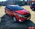 Красный Киа Рио, объемом двигателя 1.6 л и пробегом 159 тыс. км за 8000 $, фото 1 на Automoto.ua