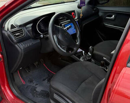 Червоний Кіа Ріо, об'ємом двигуна 1.4 л та пробігом 158 тис. км за 6500 $, фото 4 на Automoto.ua