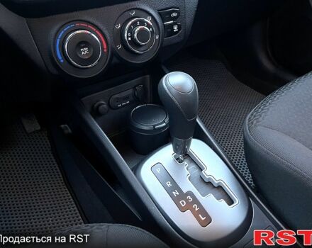 Червоний Кіа Ріо, об'ємом двигуна 1.6 л та пробігом 1130 тис. км за 9500 $, фото 12 на Automoto.ua