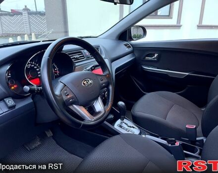 Червоний Кіа Ріо, об'ємом двигуна 1.6 л та пробігом 1130 тис. км за 9500 $, фото 9 на Automoto.ua