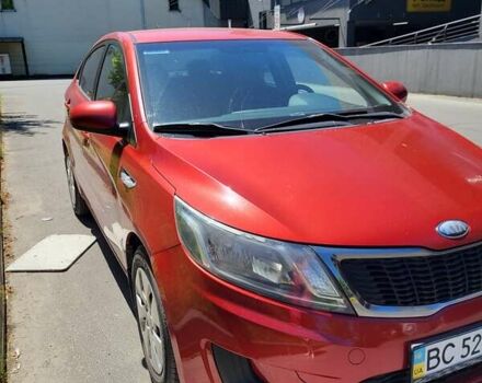 Красный Киа Рио, объемом двигателя 1.4 л и пробегом 126 тыс. км за 7900 $, фото 1 на Automoto.ua