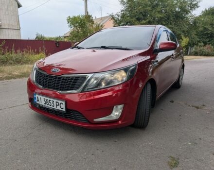 Червоний Кіа Ріо, об'ємом двигуна 1.4 л та пробігом 181 тис. км за 6837 $, фото 1 на Automoto.ua