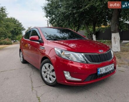 Красный Киа Рио, объемом двигателя 1.4 л и пробегом 181 тыс. км за 6800 $, фото 1 на Automoto.ua