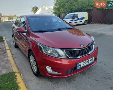 Красный Киа Рио, объемом двигателя 1.59 л и пробегом 128 тыс. км за 8000 $, фото 2 на Automoto.ua