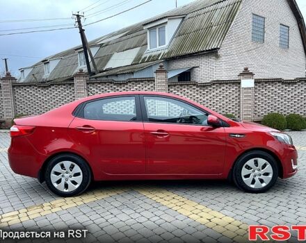 Червоний Кіа Ріо, об'ємом двигуна 1.6 л та пробігом 1130 тис. км за 9500 $, фото 7 на Automoto.ua