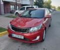 Красный Киа Рио, объемом двигателя 1.59 л и пробегом 128 тыс. км за 8000 $, фото 1 на Automoto.ua