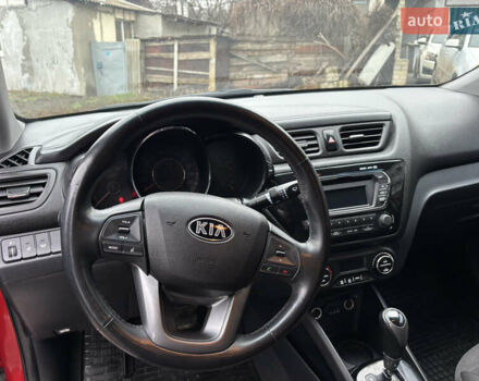 Червоний Кіа Ріо, об'ємом двигуна 1.6 л та пробігом 35 тис. км за 9998 $, фото 8 на Automoto.ua